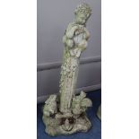 A reconstituted stone garden figure of Pan on fluted column, H.84cm