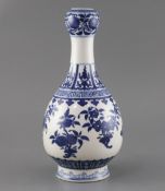 A Chinese blue and white garlic neck vase, Qianlong seal mark but later, drilled hole through