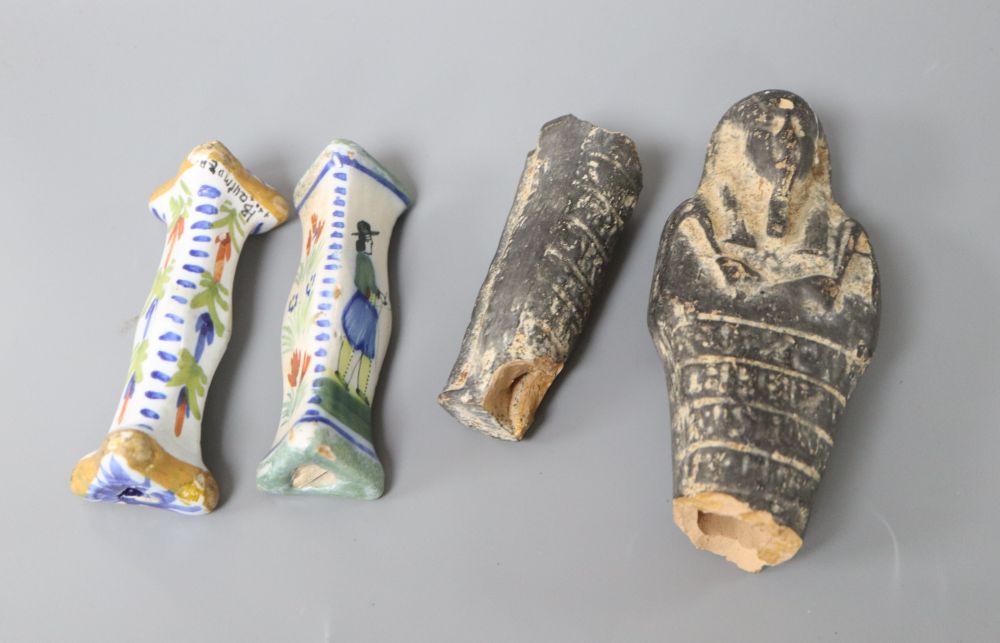 An Egyptian Shabti and a pair of Quimper knife rests