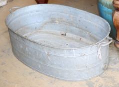 A galvanised metal tub, W.104cm, D.58cm, H.29cm