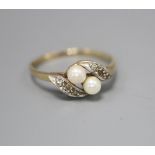 A 9ct gold seed pearl and diamond chip dress ring, size N