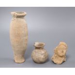 A group of Etruscan/Roman pottery including a bust, a pot and a vase