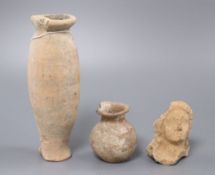 A group of Etruscan/Roman pottery including a bust, a pot and a vase