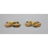 A pair of French Art Deco three colour gold cufflinks, gross 9.1 grams