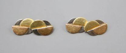 A pair of French Art Deco three colour gold cufflinks, gross 9.1 grams