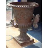 A pair of Victorian cast iron campana-shaped urns, H.74cm, diameter 56cm