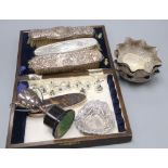 A set of four Indian white metal bon-bon dishes, 11cm, a silver nut dish, a small trophy cup and