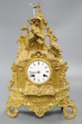 A French gilt figural mantel clock, by Rollis of Paris, height 36cm