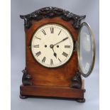 A Regency mahogany eight day bracket clock, with a carved domed top, height 45cm