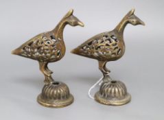 A pair of Indian brass bird finials, height 16cm