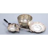 A George V plain silver sugar bowl, diameter 10.5cm, 4oz., a Victorian condiments spoon and an