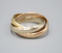 A Must de Cartier three colour 18ct gold 'Russian' triple band wedding ring, numbered 0 6373 L, size