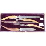 A cased Fenton Bros. carving set with antler handles