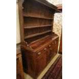 A George III oak dresser, W.160cm, D.48cm, H.197cmCONDITION: The top is marked, scuffed and