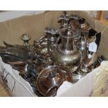 A collection of plated tablewares, including trays, two candelabra, glass pickle jar and stand,