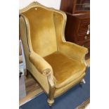 A Louis XVI style carved giltwood bergere armchair, W.87cm