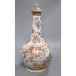 A Chinese famille rose bottle vase with associated cover, height 40cm