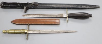 A bayonet and two daggers
