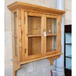 A pine wall cabinet, W.91cm