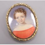 A late 19th century miniature portrait of a girl