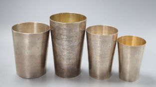 Three 19th century Indian white metal tumbler cups, retailer's Grish C.Dutt of Calcutta (2) and