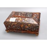 A 19th century tortoiseshell and mother of pearl sewing box, height 10.5cm