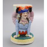 A French coloured biscuit 'acrobat' cup, height 14cm