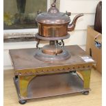 A copper hot plate with copper spirit kettle and stand