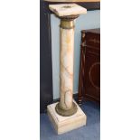 A pair of onyx pedestals, H.103cm