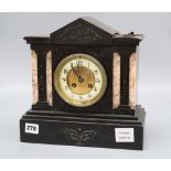 A French black and rouge marble eight day mantel clock