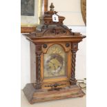 An early 20th century walnut bracket clock