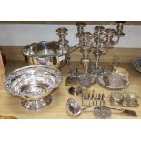 A collection of plated wares and a silver toastrack