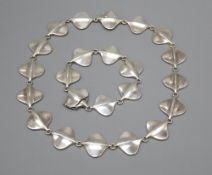 A Georg Jensen silver necklace with stylised oval links, number 176 and matching bracelet, number