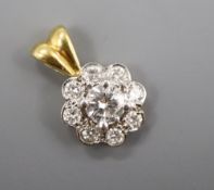 An 18ct. gold diamond cluster pendant, 0.75cm, gross 1.6 grams