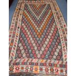 A large Turkish Kelim rug, 305 x 178cm