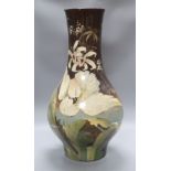 A large late 19th century Art pottery vase, height 63cm