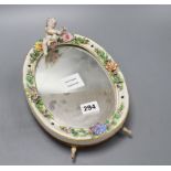 A German porcelain floral encrusted easel mirror, height 28cm