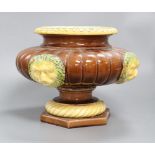 A Victorian majolica style jardiniere on associated stand, height 24cm