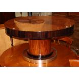 A 1930's mahogany and ebonised circular topped coffee table, with chrome bordered plinth, diameter