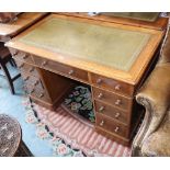 A late Victorian oak pedestal desk, W.107cm