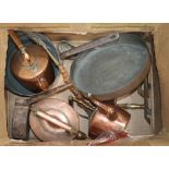 A collection of Victorian copper and brass items, including a large copper saucepan