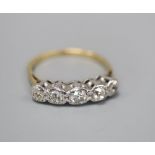 An 18ct and graduated illusion set five stone diamond half hoop ring, size L, gross 2.9 grams.