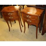 A pair of Louis XV style serpentine fronted two drawer kingwood chest, on slender cabriole legs, W.