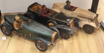Three models of gentlemen driving cars