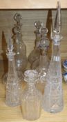 A silver collared decanter and eight other decanters, tallest 46cm incl. stopper