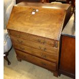 A George III mahogany bureau fitted four long drawers on bracket feet, W.86cm