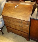 A George III mahogany bureau fitted four long drawers on bracket feet, W.86cm