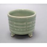 A Chinese celadon tripod censer, height 8cm