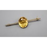A 15ct gold gem set bar brooch, 5.25cm