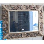 A 19th century Flemish painted and carved oak wall mirror, W.82cm, H.62cm
